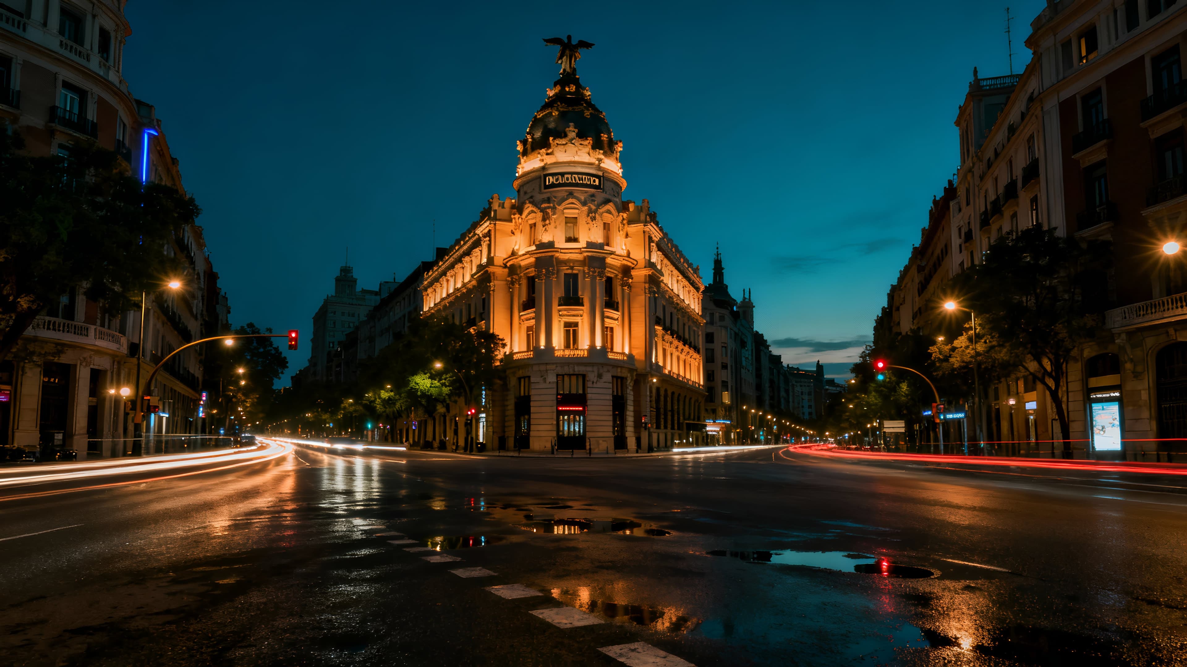 Stately Madrid architecture against a night sky.